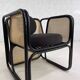 Cubic armchair in black rattan and canework