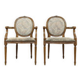 Paire de fauteuils louis XVI a dossiers médaillons