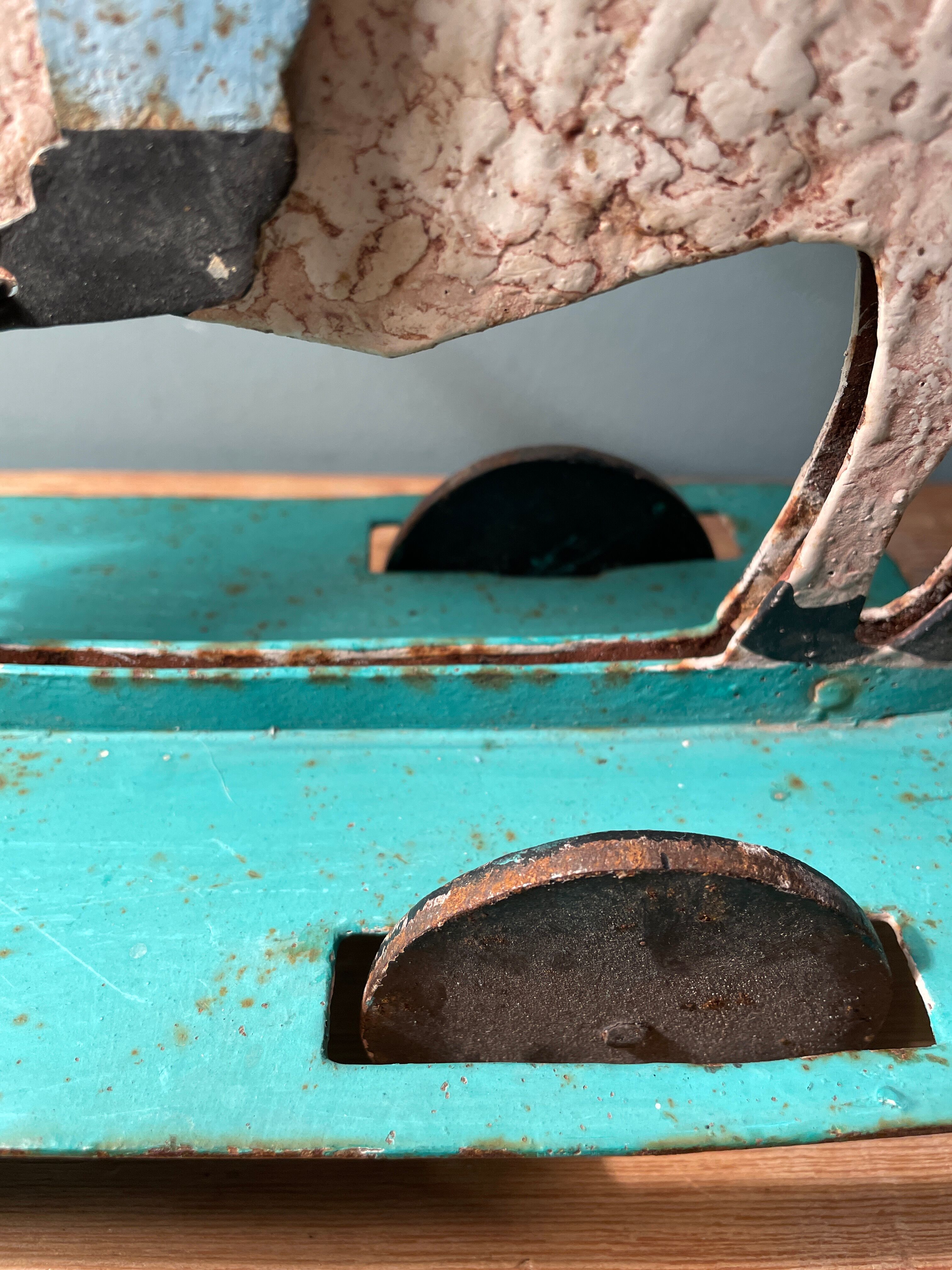 Old painted metal pulling toy
