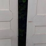 Pair of cupboard doors and old woodwork frame