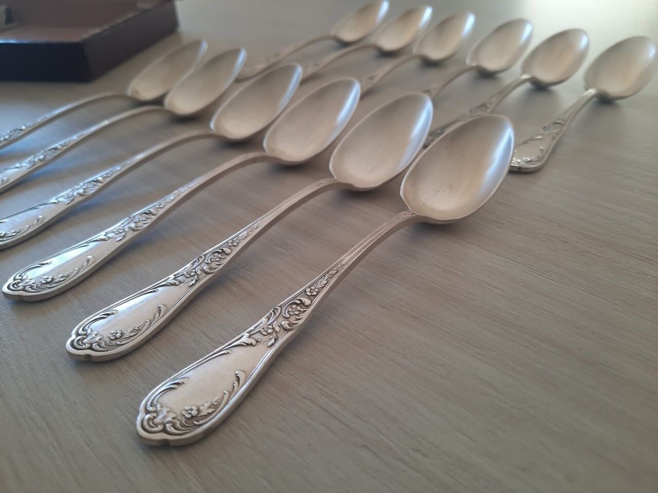 Box of 12 small old spoons in silver metal