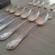 Box of 12 small old spoons in silver metal