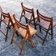 A set of 4 vintage folding wooden chairs, 1970s.