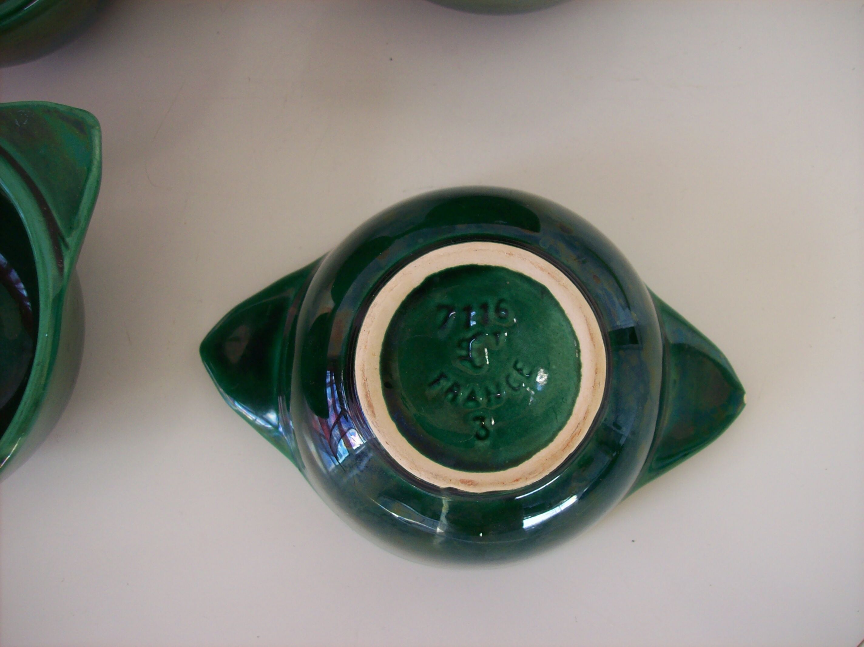 Suite of four former St. Clement bowls