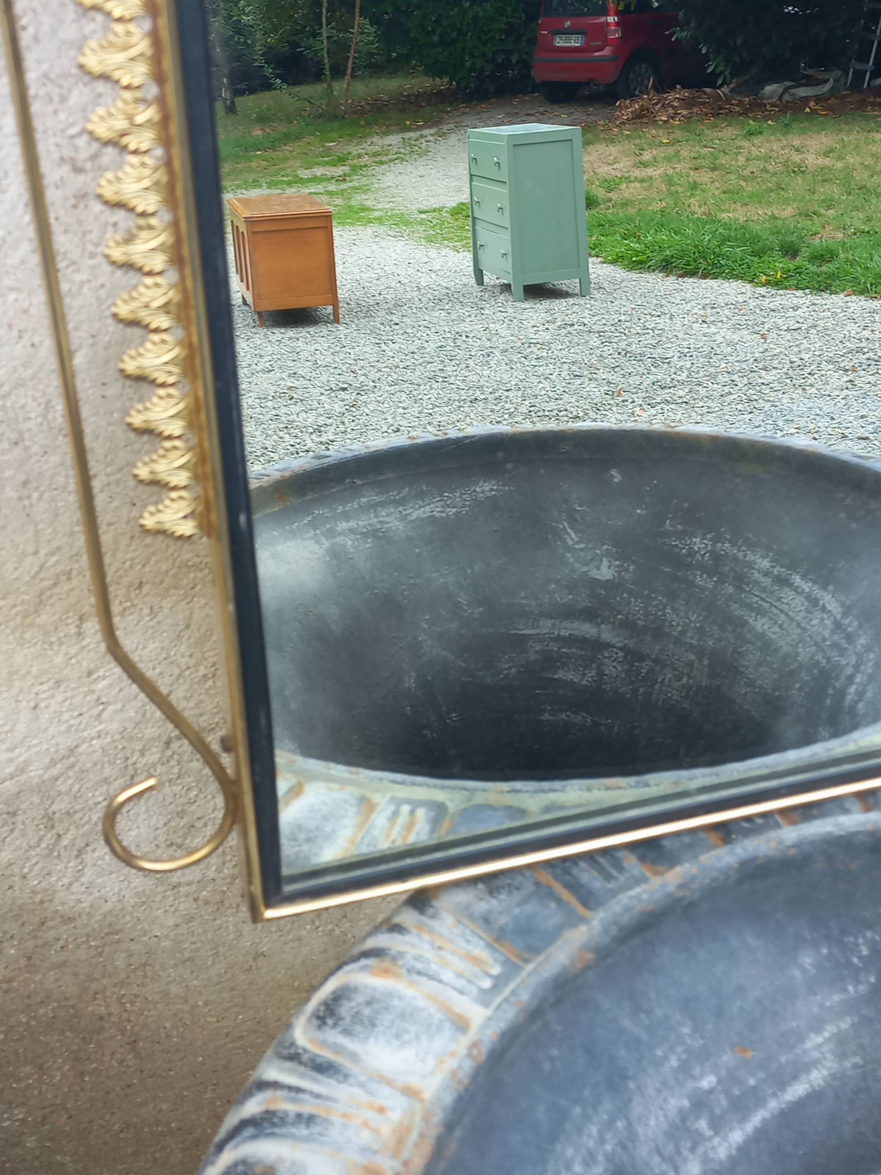 Vintage 1950s neoclassical style gold metal mirror