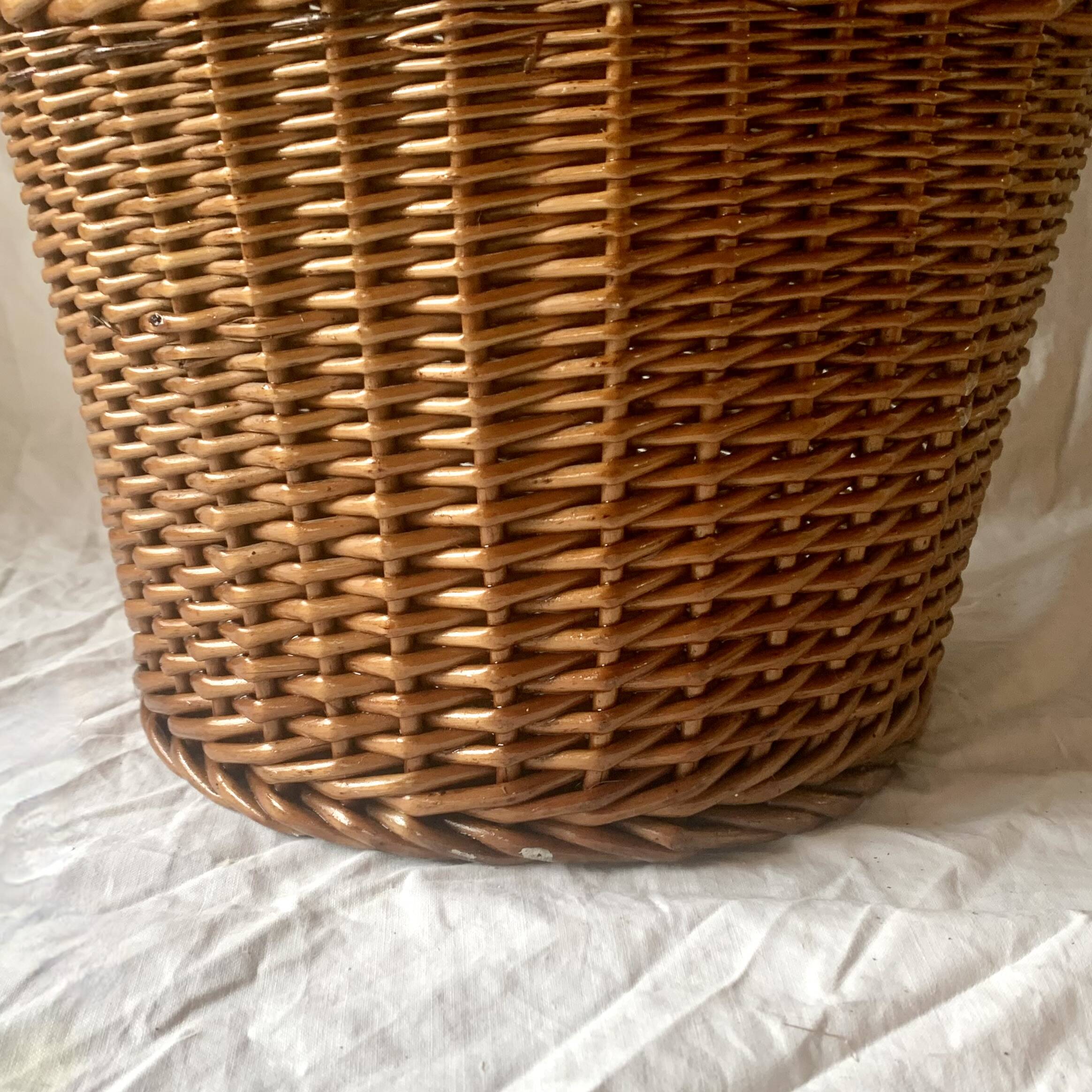 Old woven wicker umbrella stand