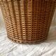 Old woven wicker umbrella stand