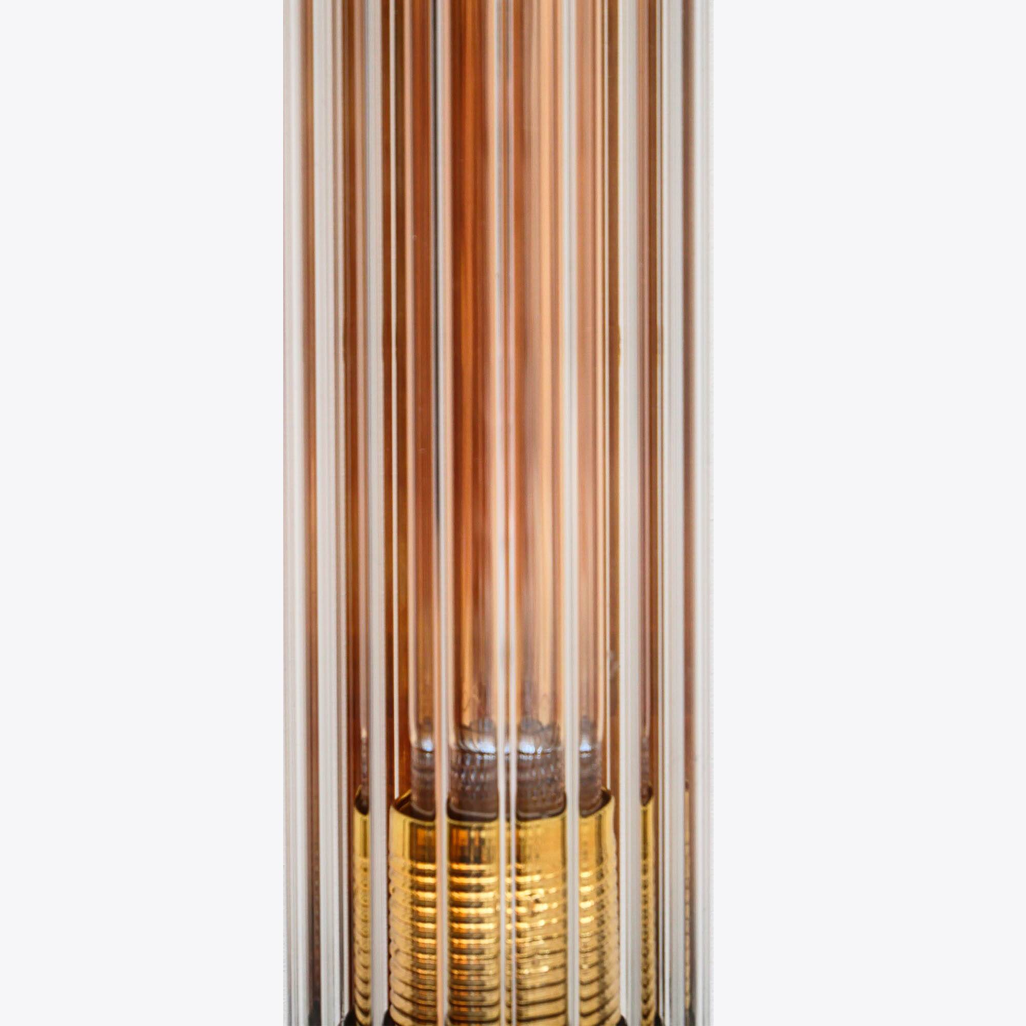 Cylindrical wall light with streaked glass and brass