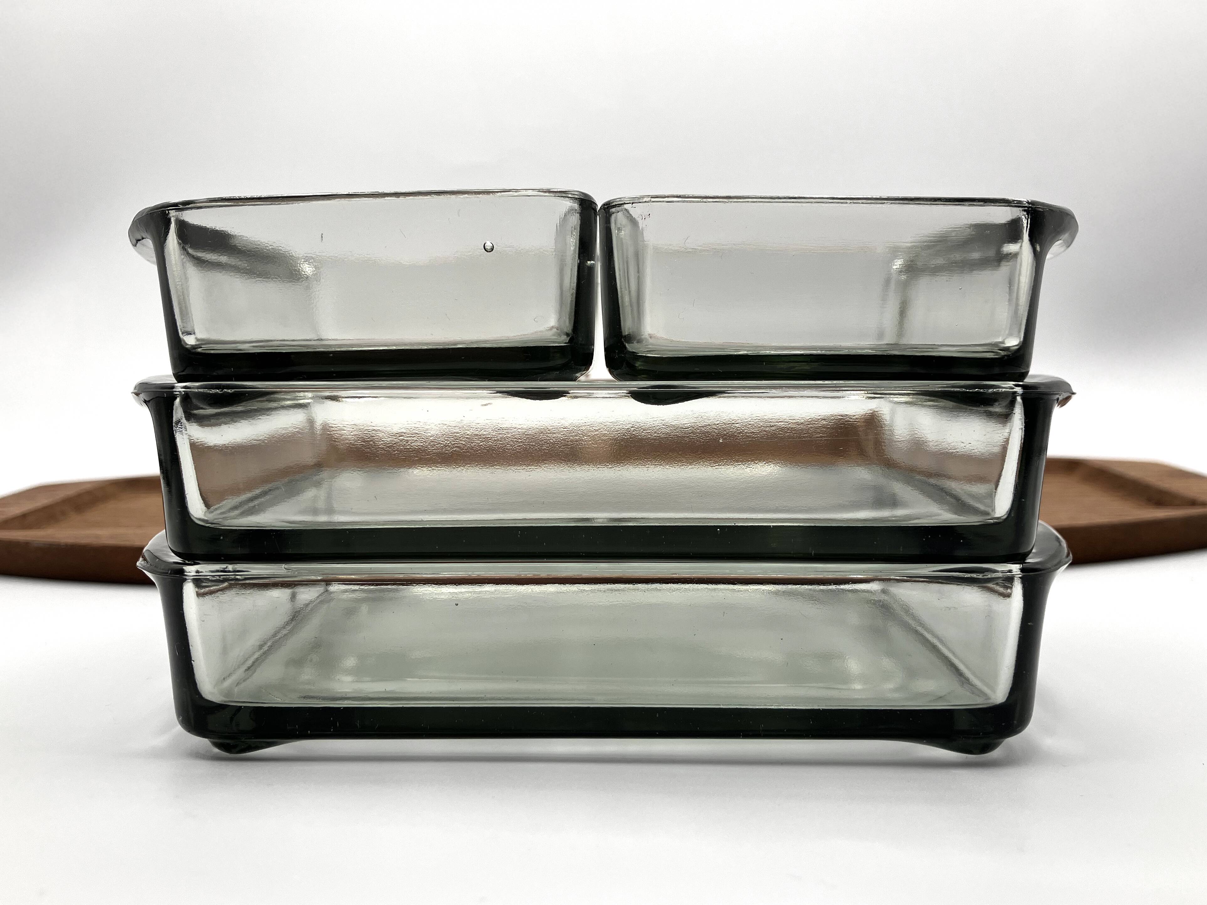 Teak tray and its 4 stackable glass dishes • Denmark • 1960