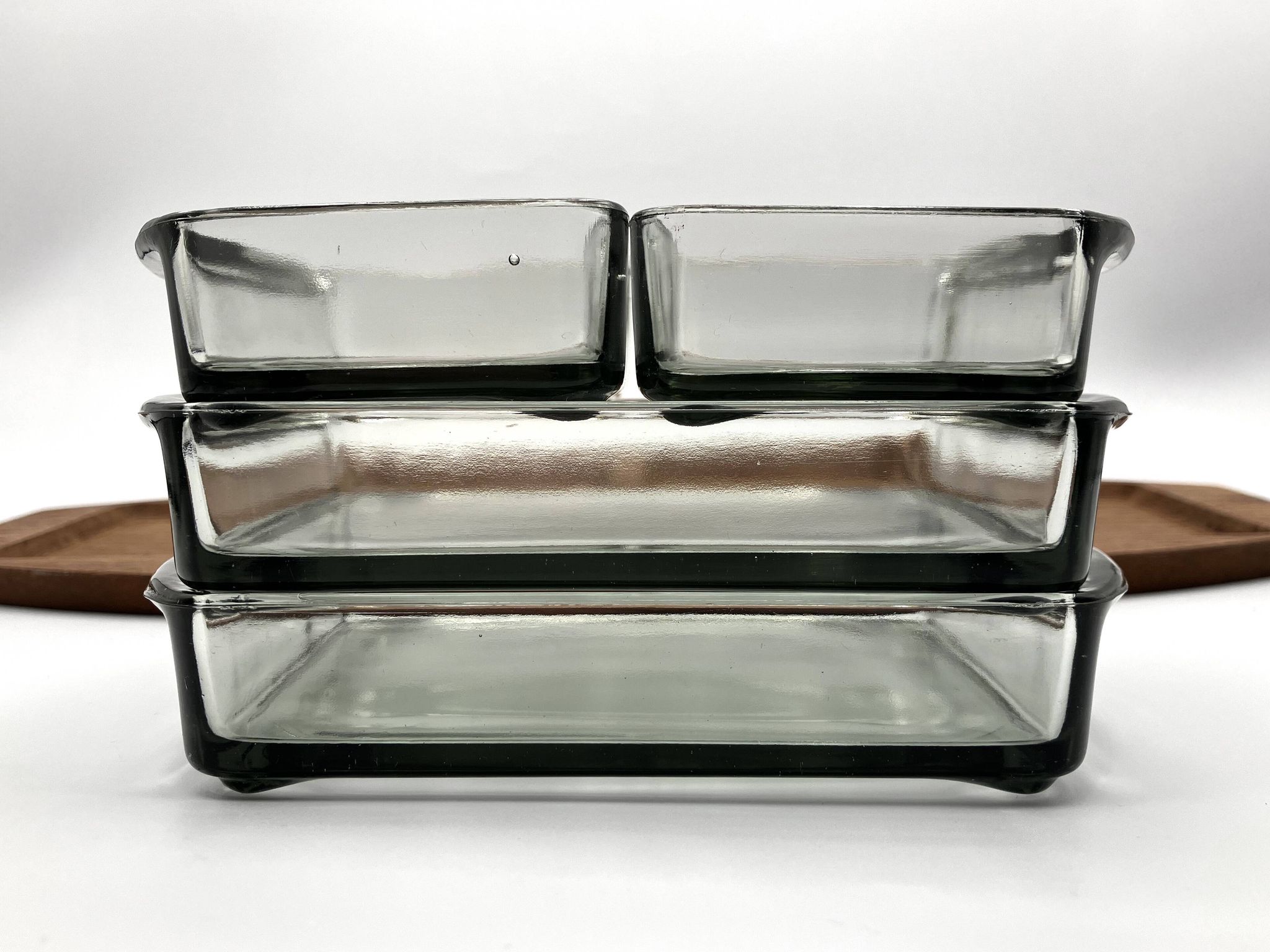 Teak tray and its 4 stackable glass dishes • Denmark • 1960