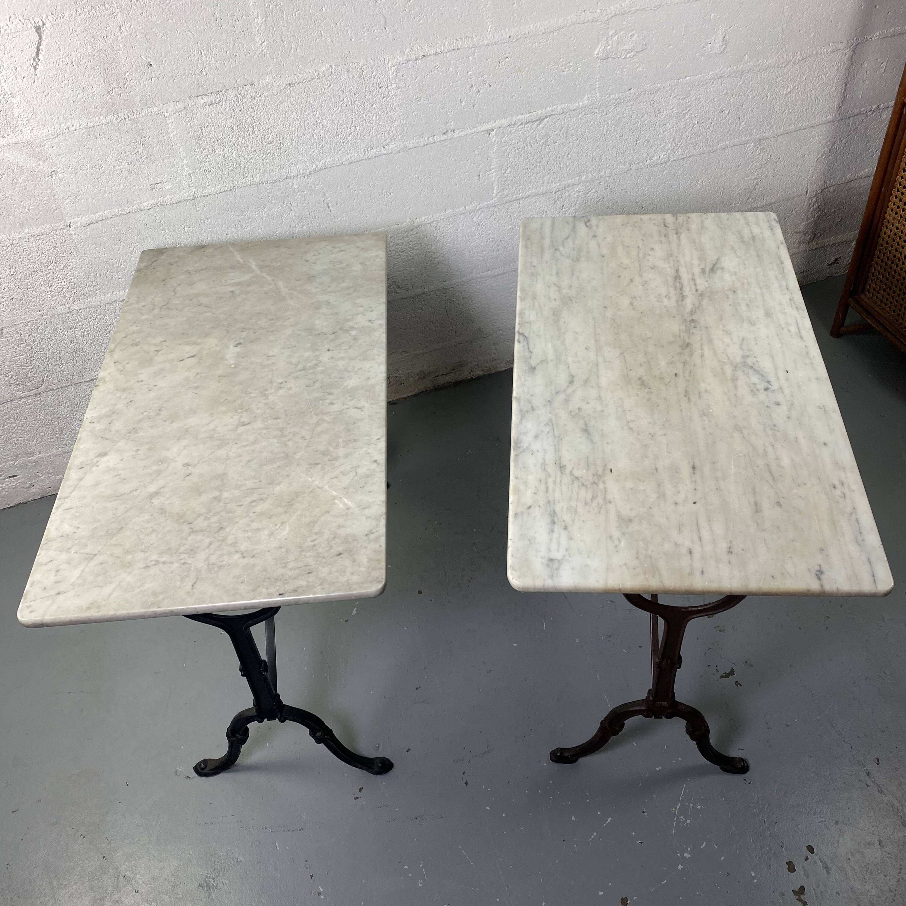 Set of two bistro tables in marble and wrought iron