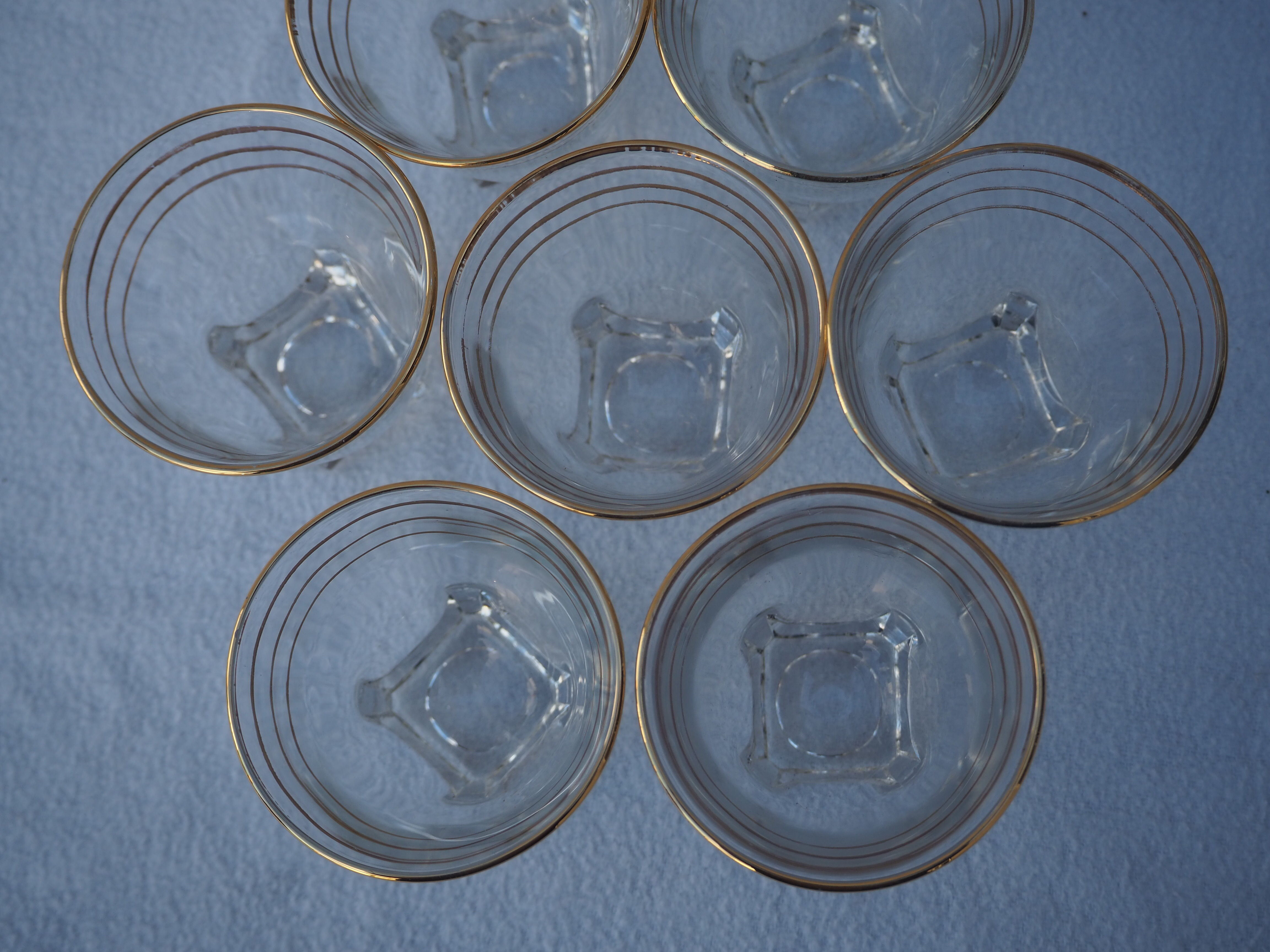 Golden liqueur service from the 1950s-1960s and its 12 glasses