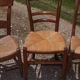 17 old straw chairs