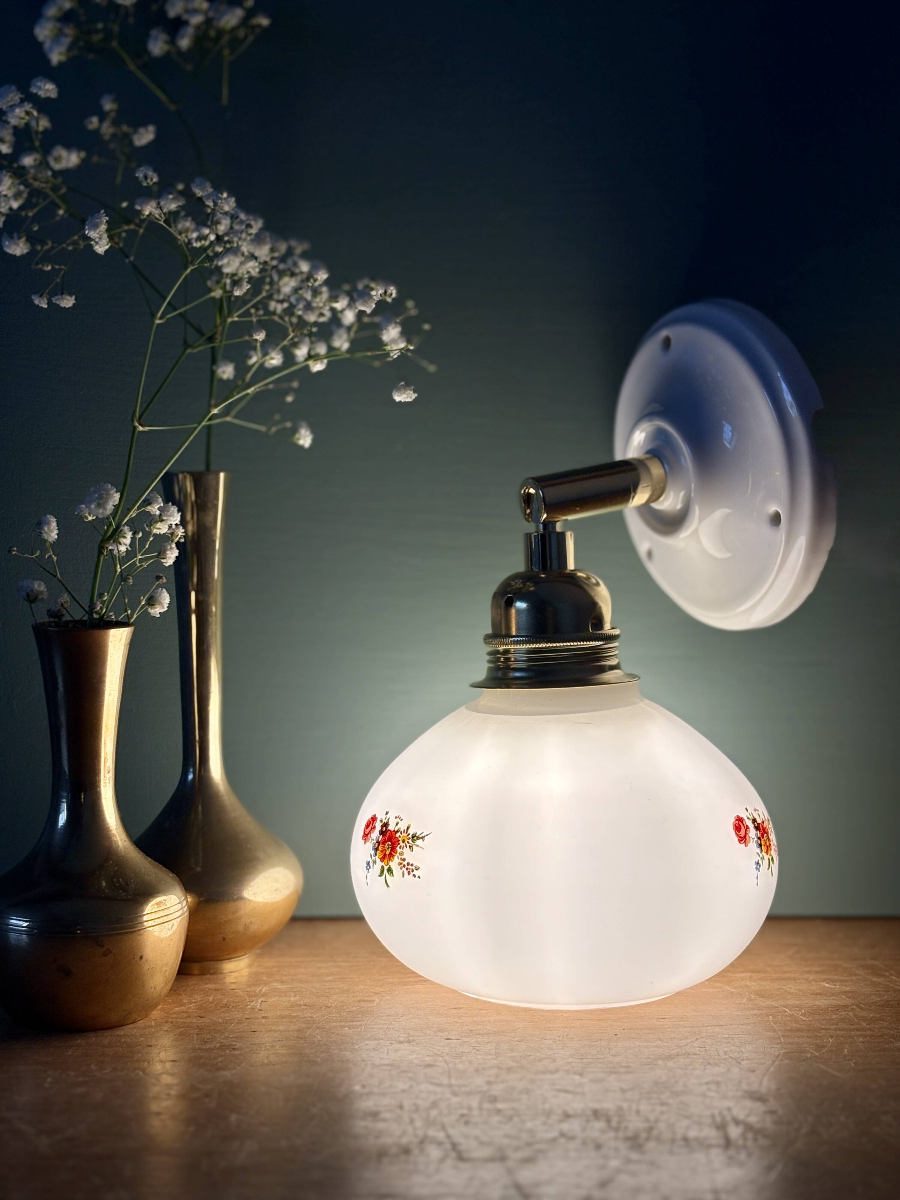 Vintage globe wall sconce in white opaline glass with floral decorations