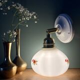 Vintage globe wall sconce in white opaline glass with floral decorations