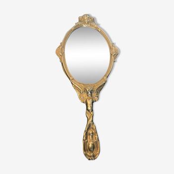 Former Louis XV hand-facing mirror in bronze at the end of the 19th century