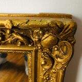 Old mirror in gilded wood 50x62cm