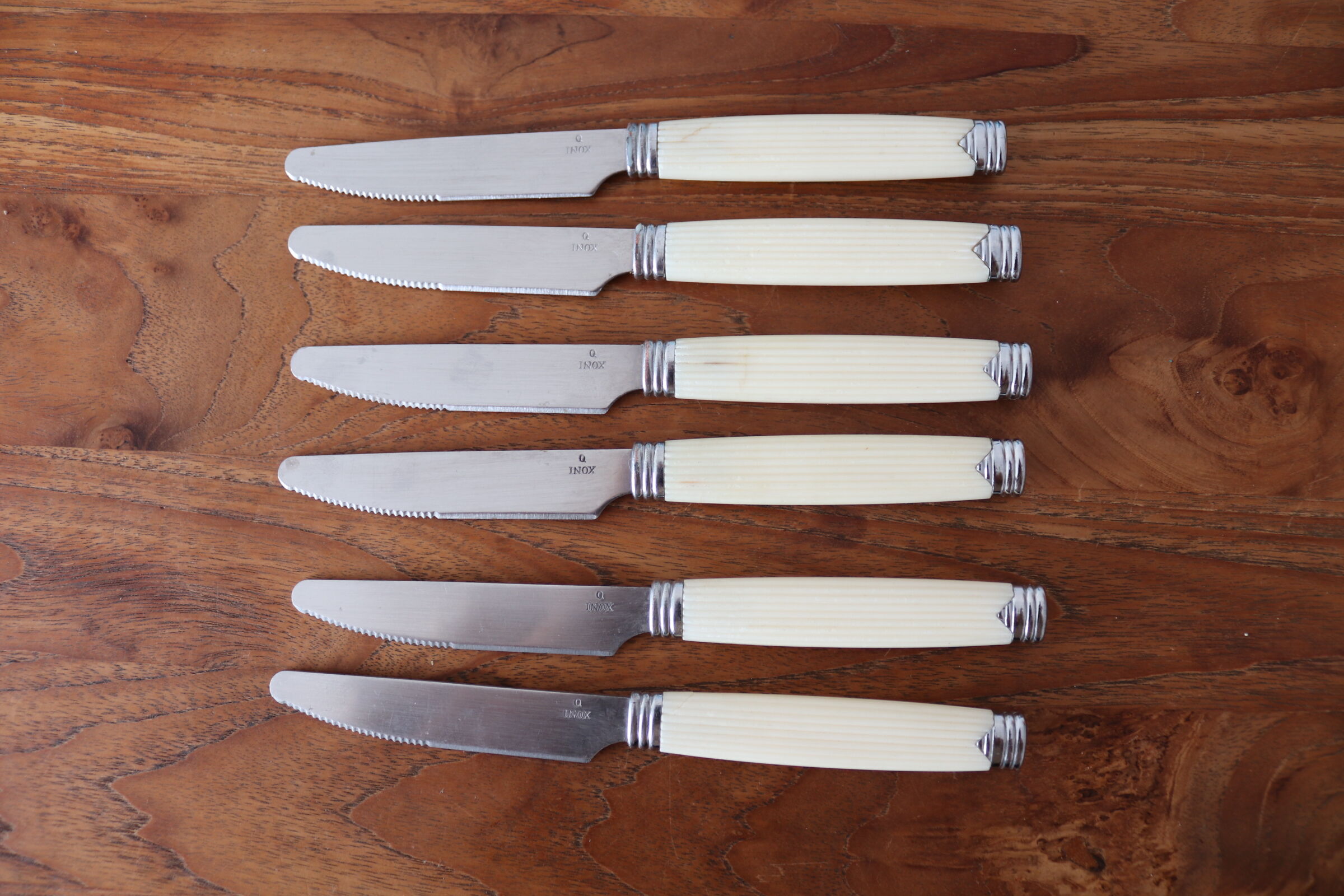 6 vintage cream white knives