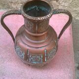 Vase has oriental cove
