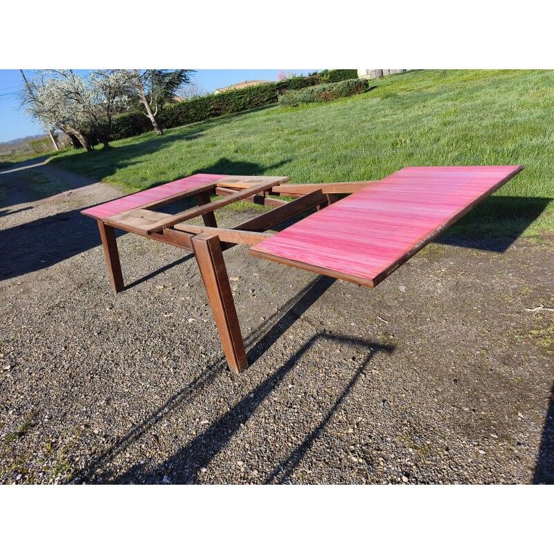 1960s oak dining table with integrated extensions.