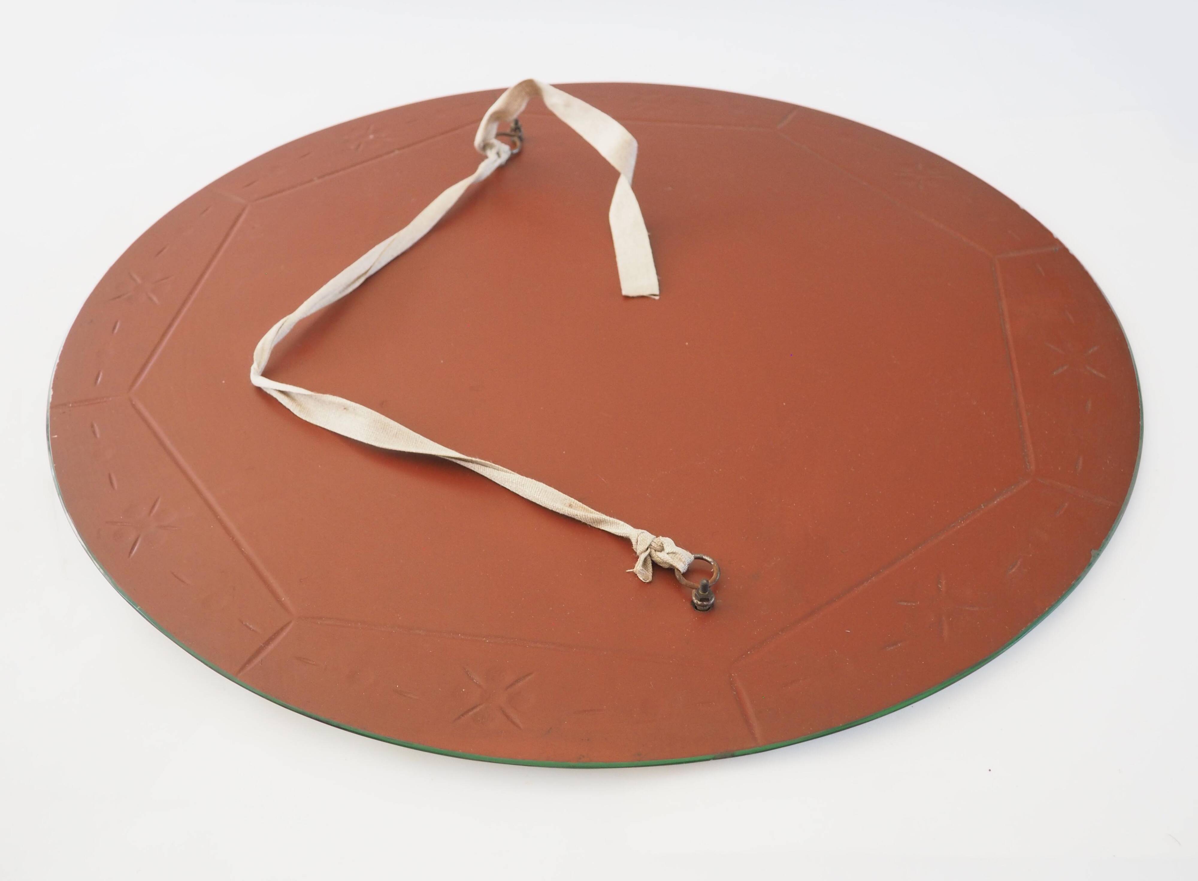 Chiseled mirror called Venetian diam 60cm