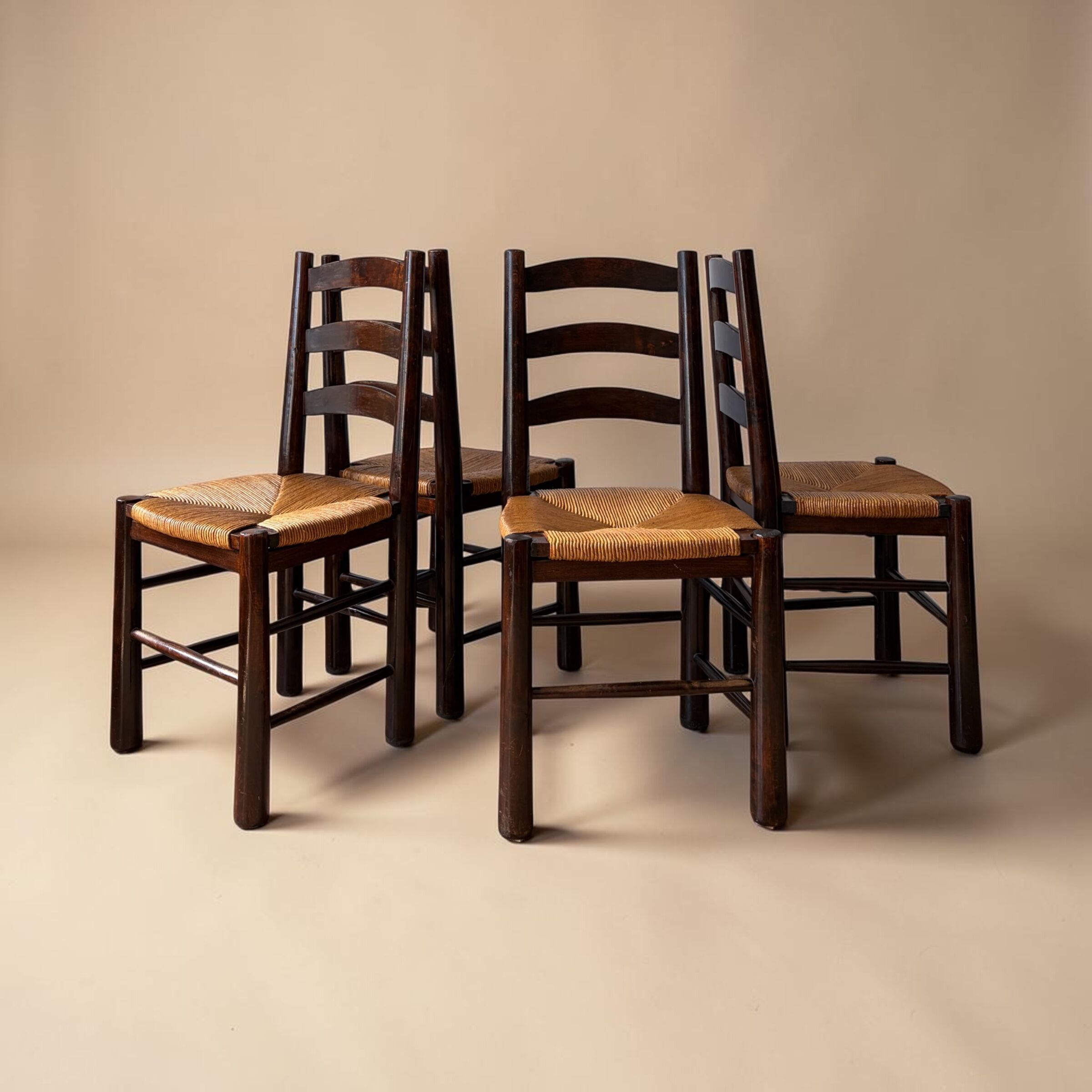 Rustic chairs attributed to Georges Robert.