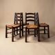 Rustic chairs attributed to Georges Robert.