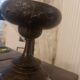 Bronze bowl on marble base
