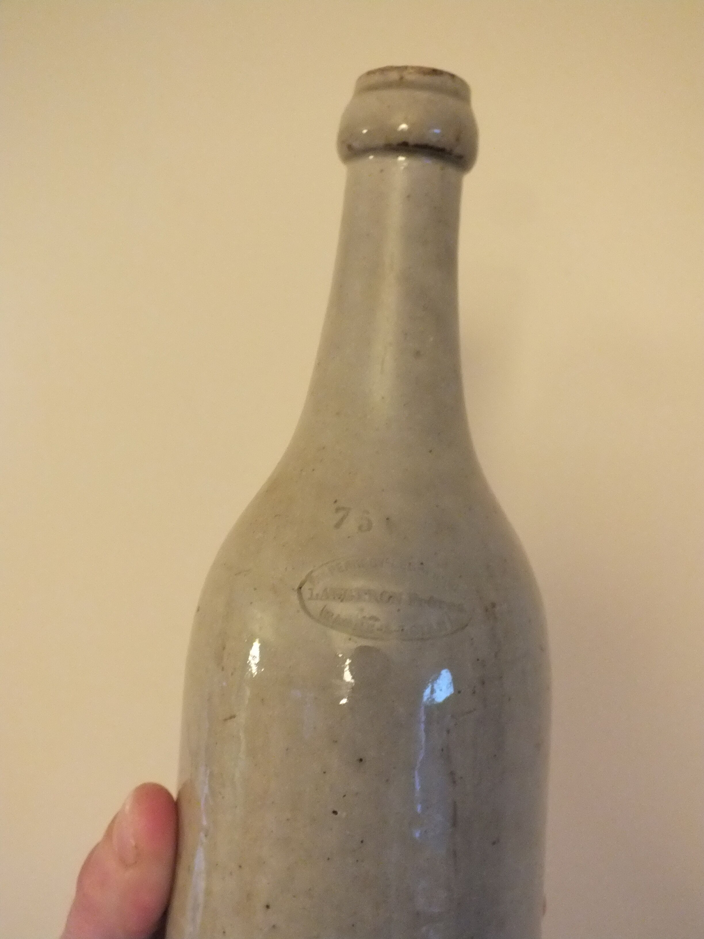 Old bottle in glazed clay of Saône et Loire