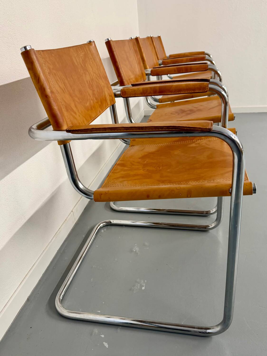 4 vintage tubular chairs with patinated leather designed by Mart Stam