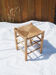 Farm stool made of wood and straw