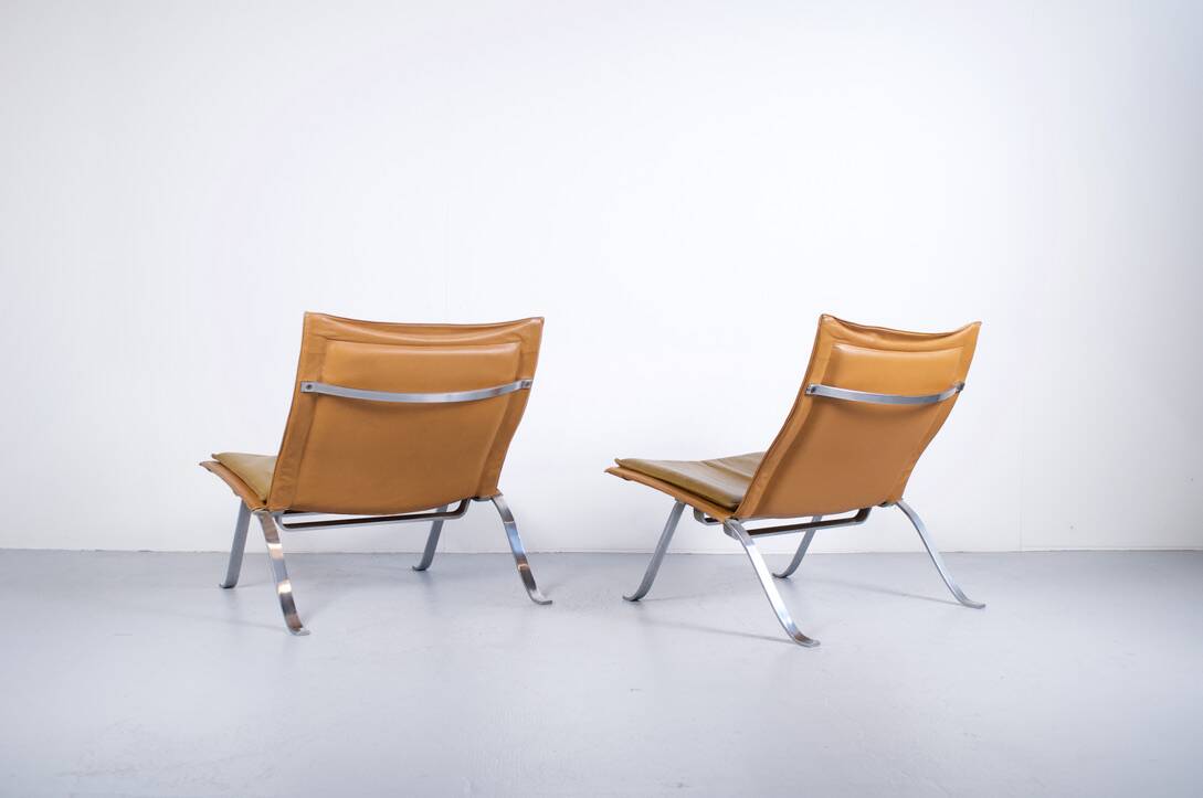 Imposing pair of leather and steel armchairs from the 1960s