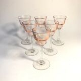 Former 6 glasses with liqueur on foot