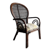 Fauteuil Manou en bambou brun foncé avec dossier ajouré en rotin, style années 1960, France
