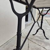 Antique marble and cast iron bistro restaurant table