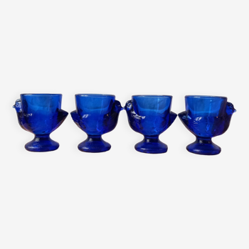 4 chicken-shaped egg cups in cobalt blue glass