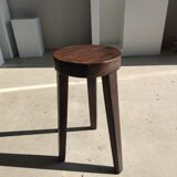 Small high tripod stool in brown solid wood