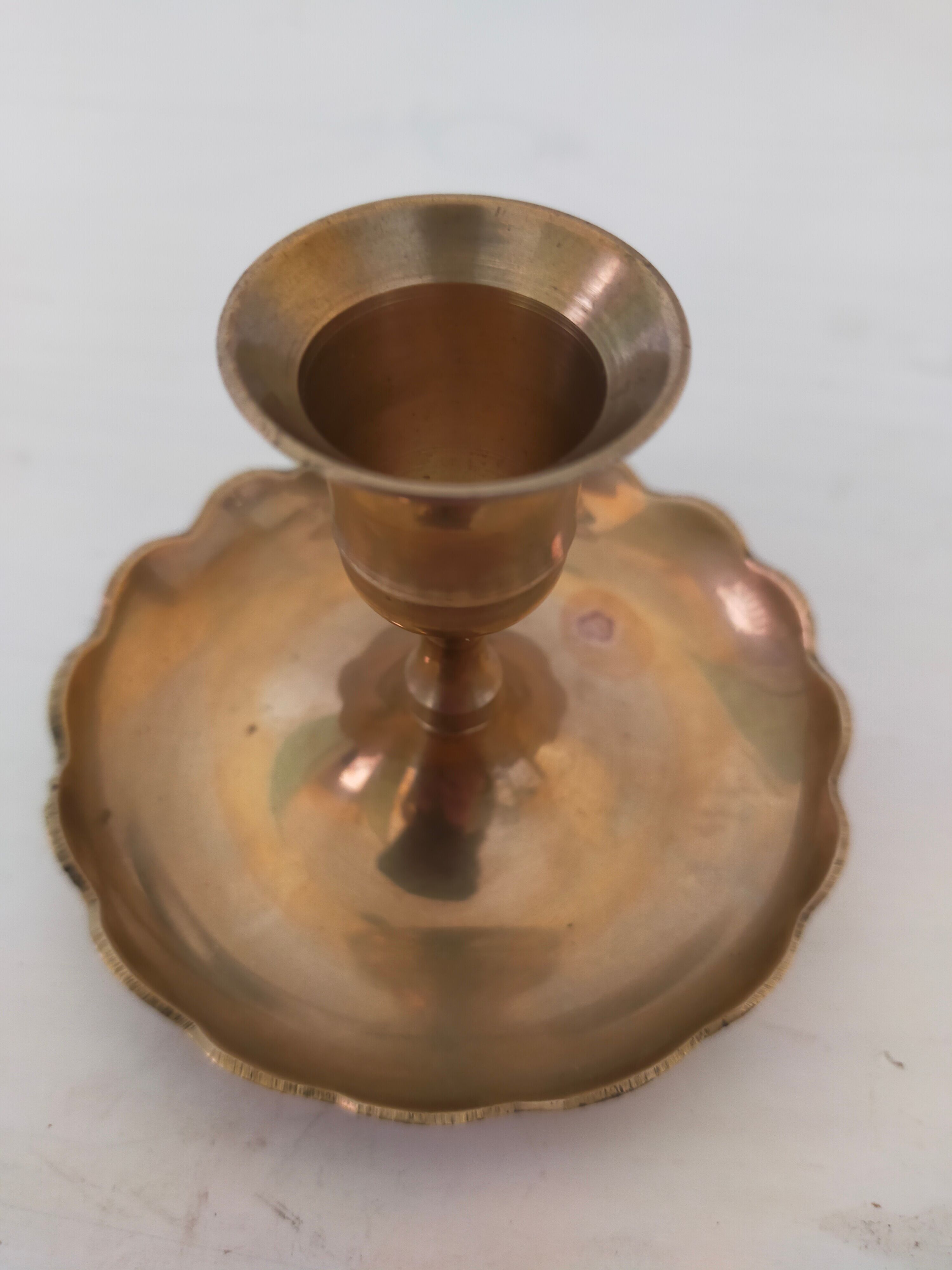 Brass handheld candle holder