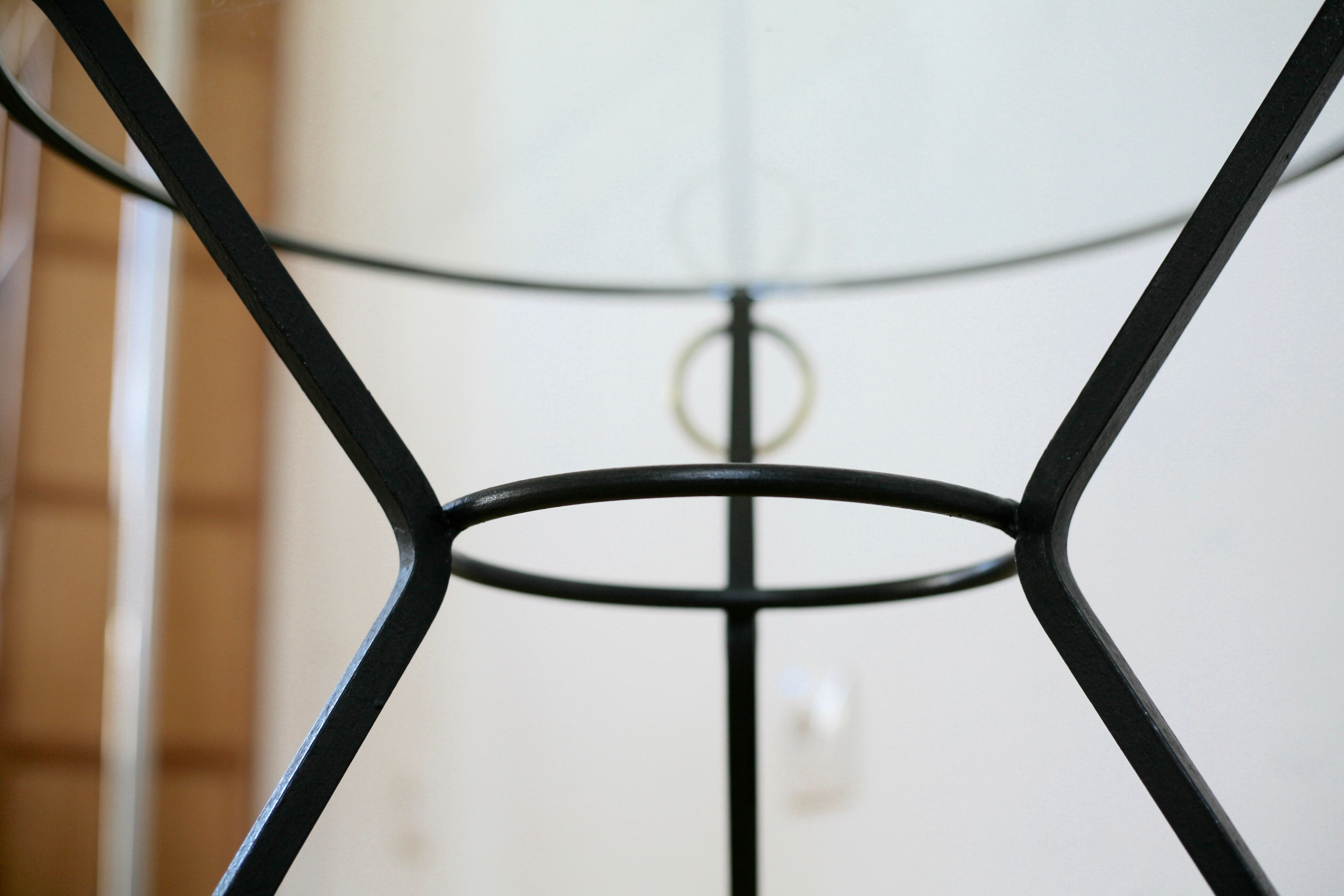 Coffee table black lacquered metal, glass and brass, France, circa 1950.