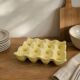 Vintage yellow ceramic egg holder