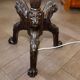 Antique floor lamp with lion motif
