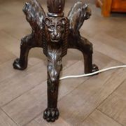 Antique floor lamp with lion motif