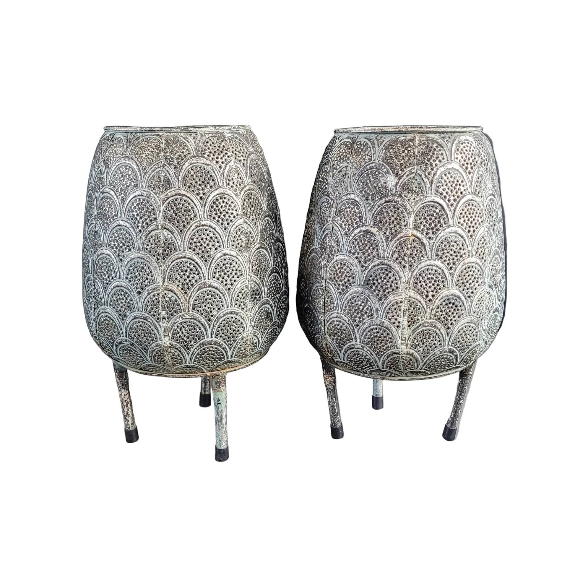 Pair of openwork metal lanterns