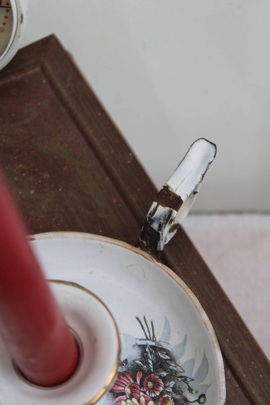 Antique enamel candle holder