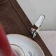 Antique enamel candle holder