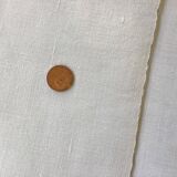 Sheet marked AT in red cross stitch