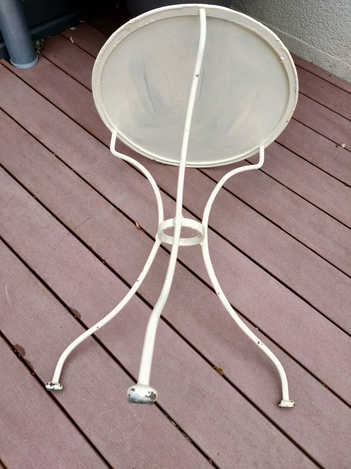 Old white iron garden table
