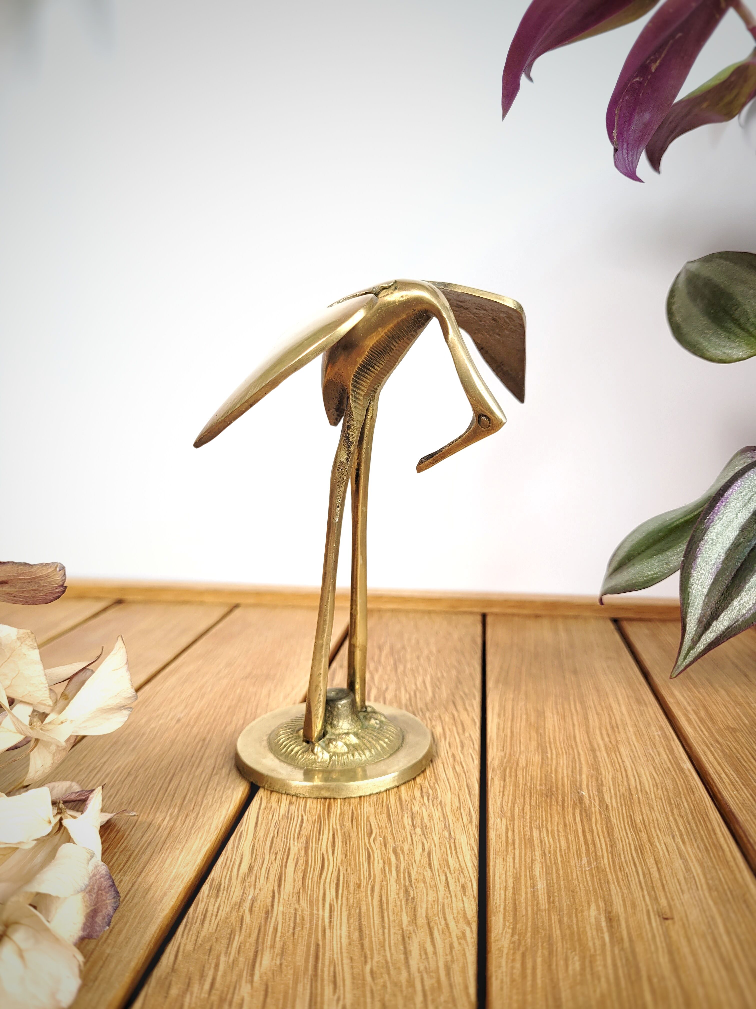 Brass heron