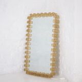 Large luminous acrylic mirror.