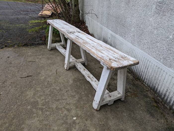 Old bench limed in white